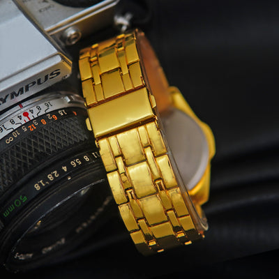 Stainless Gold Band Quartz Wrist Watch Black CD Collection Turntable Dial Men